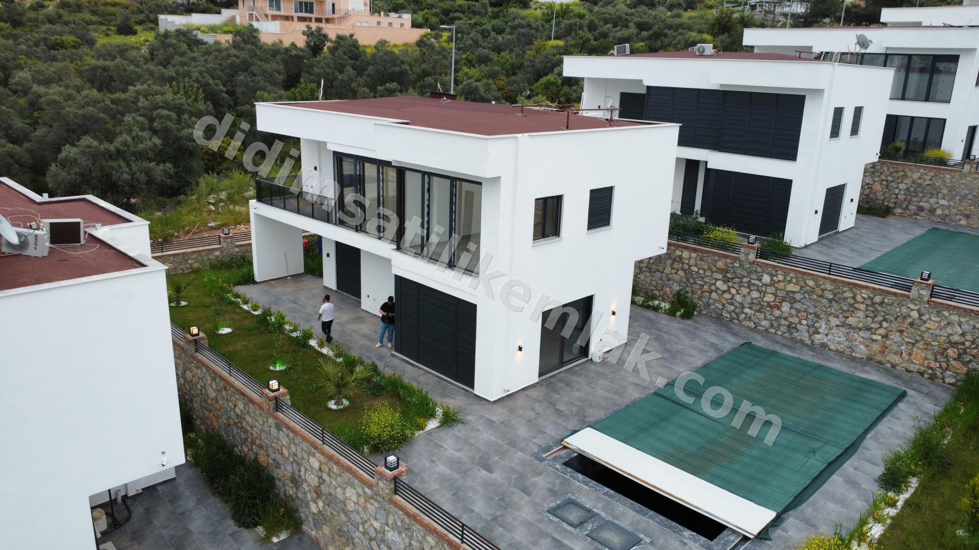 Aydin Didim Akbük 500 m2 arsa icinde havuzlu 4+1 lüx villa